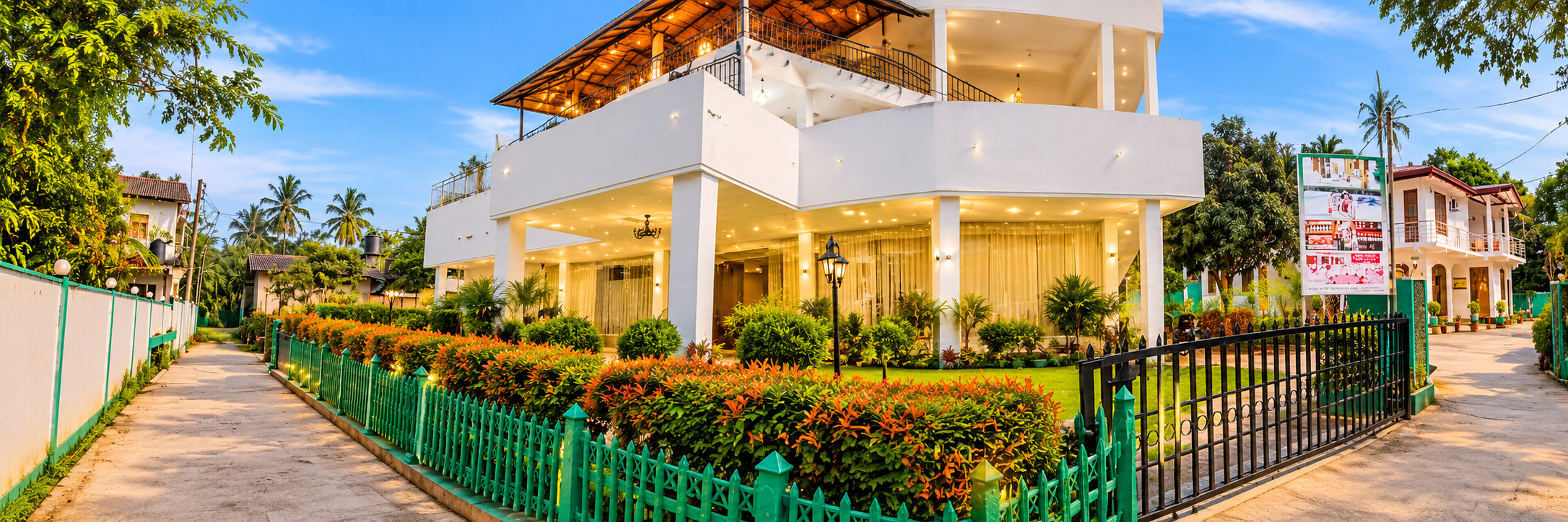 Verandah corridor and tropical garden at Hotel Green View Buttala